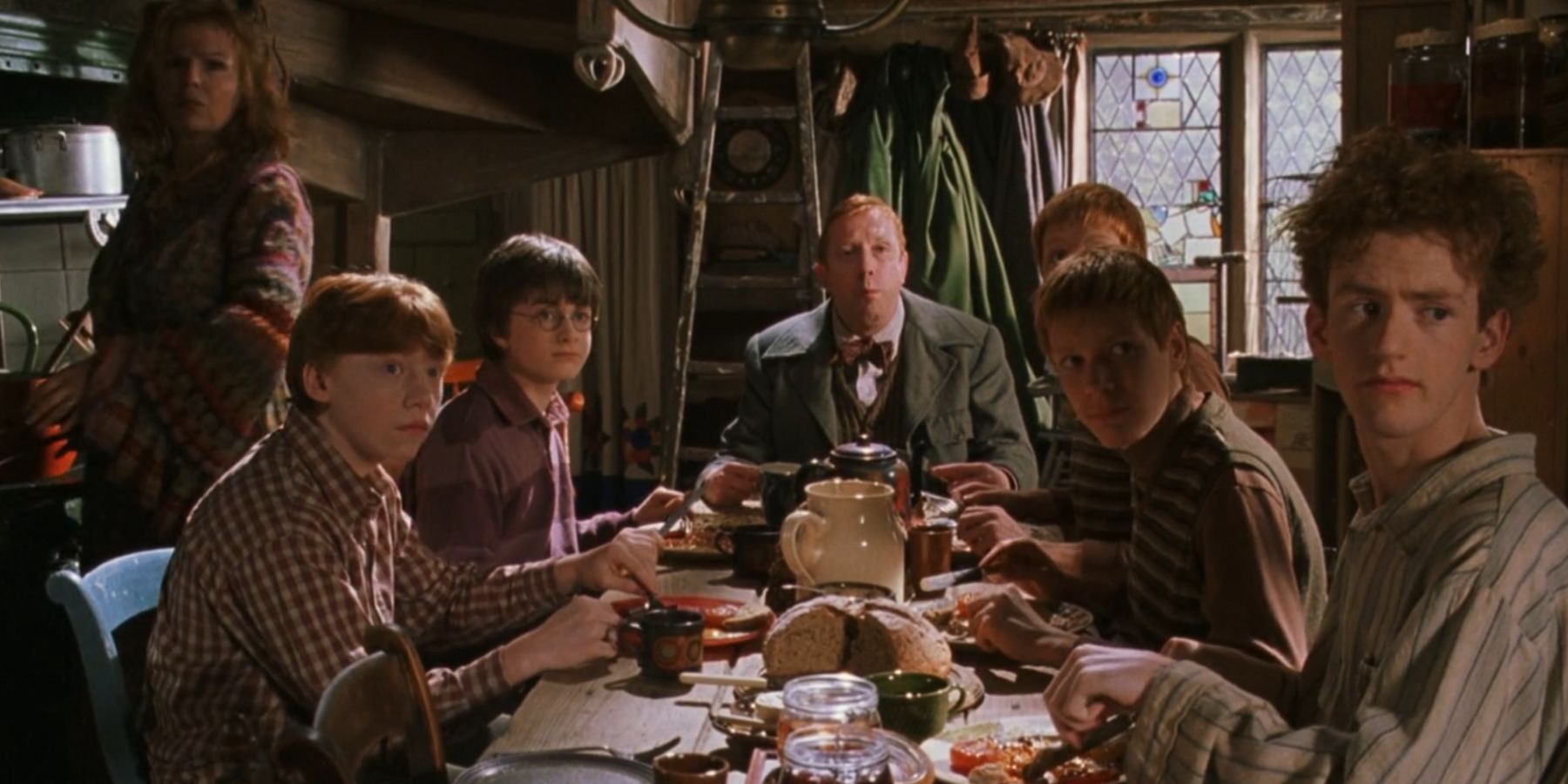 Harry Potter with the Weasley family in Harry Potter and the Chamber of Secrets.