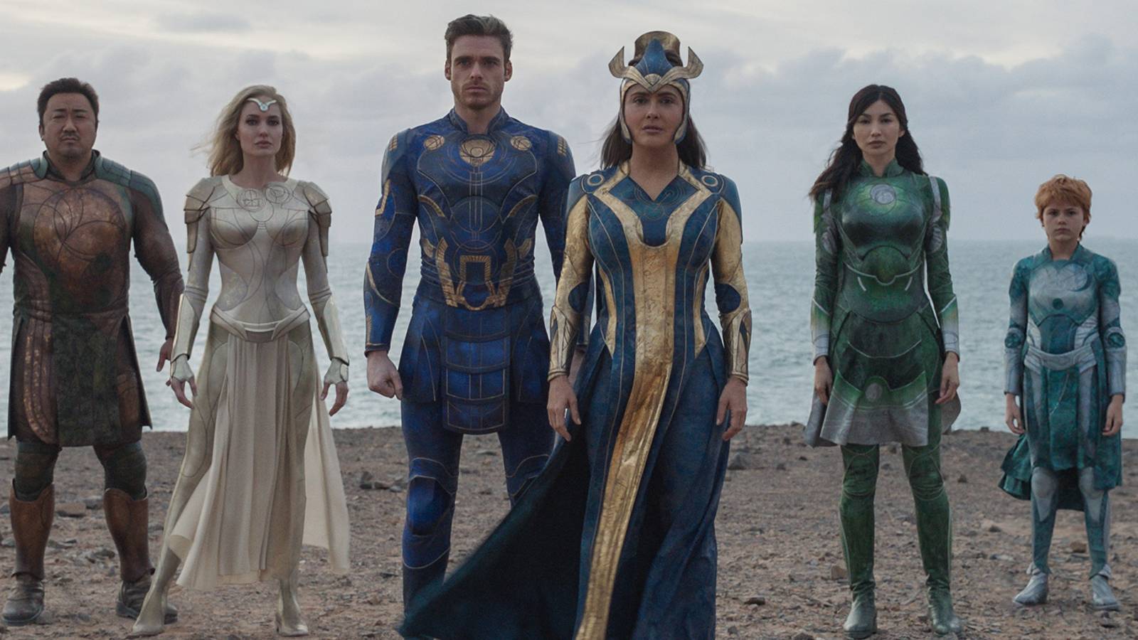 The Eternals standing on a beach in Eternals