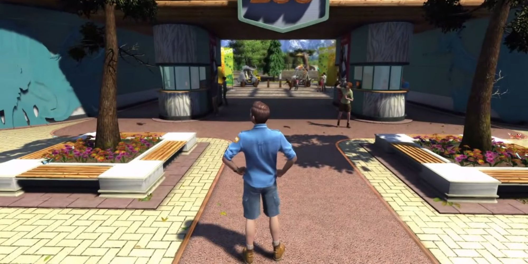 In Zoo Tycoon, the animal keeper stands at the entrance of a zoo