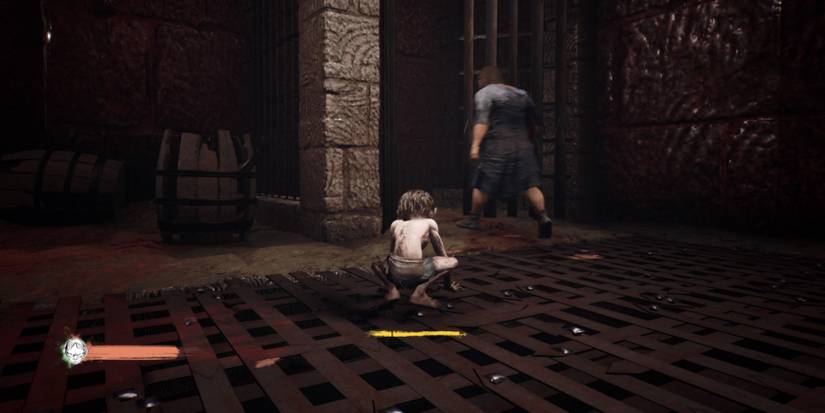 Gollum watches the Greshnag open a door in The Lord of the Rings: Gollum