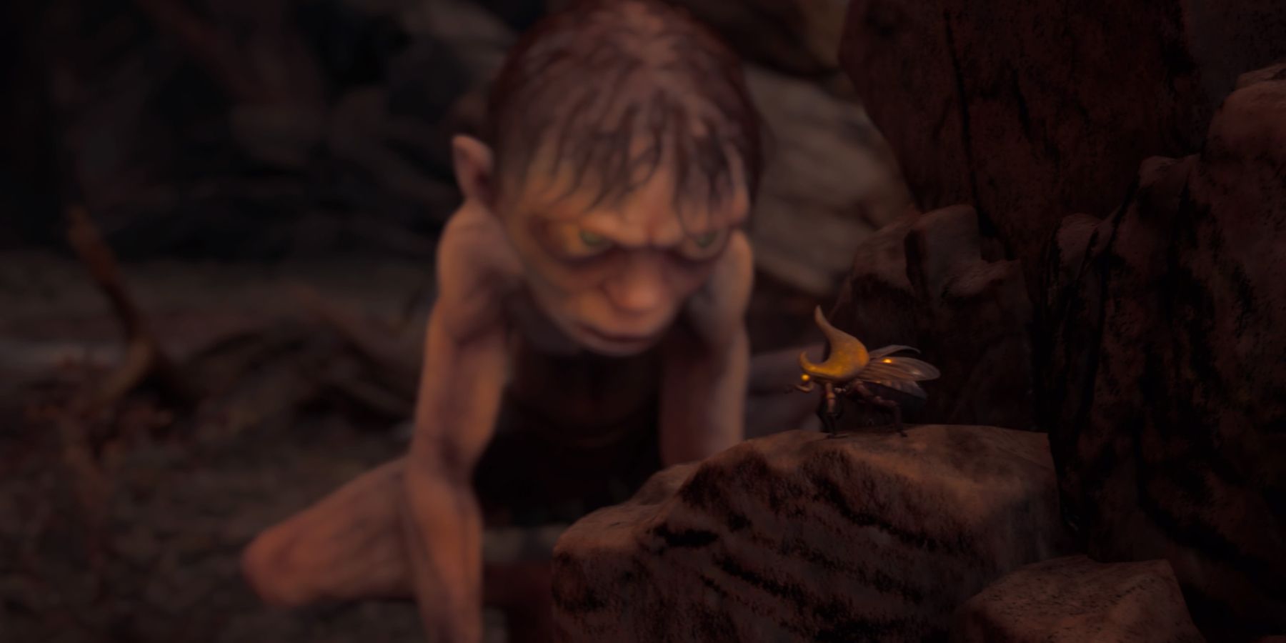 Gollum stares at a bug in The Lord of the Rings: Gollum