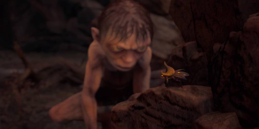 Gollum stares at a beetle in The Lord of the Rings: Gollum