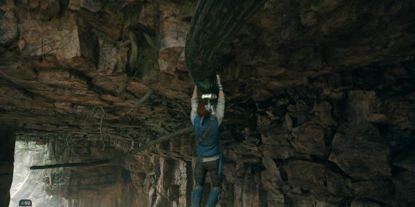 Cal hangs from a log in Star Wars Jedi: Survivor