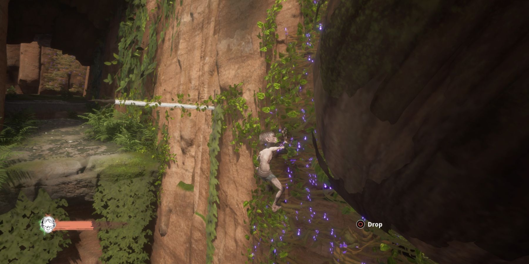 Gollum climbs some purple vines in The Lord of the Rings: Gollum