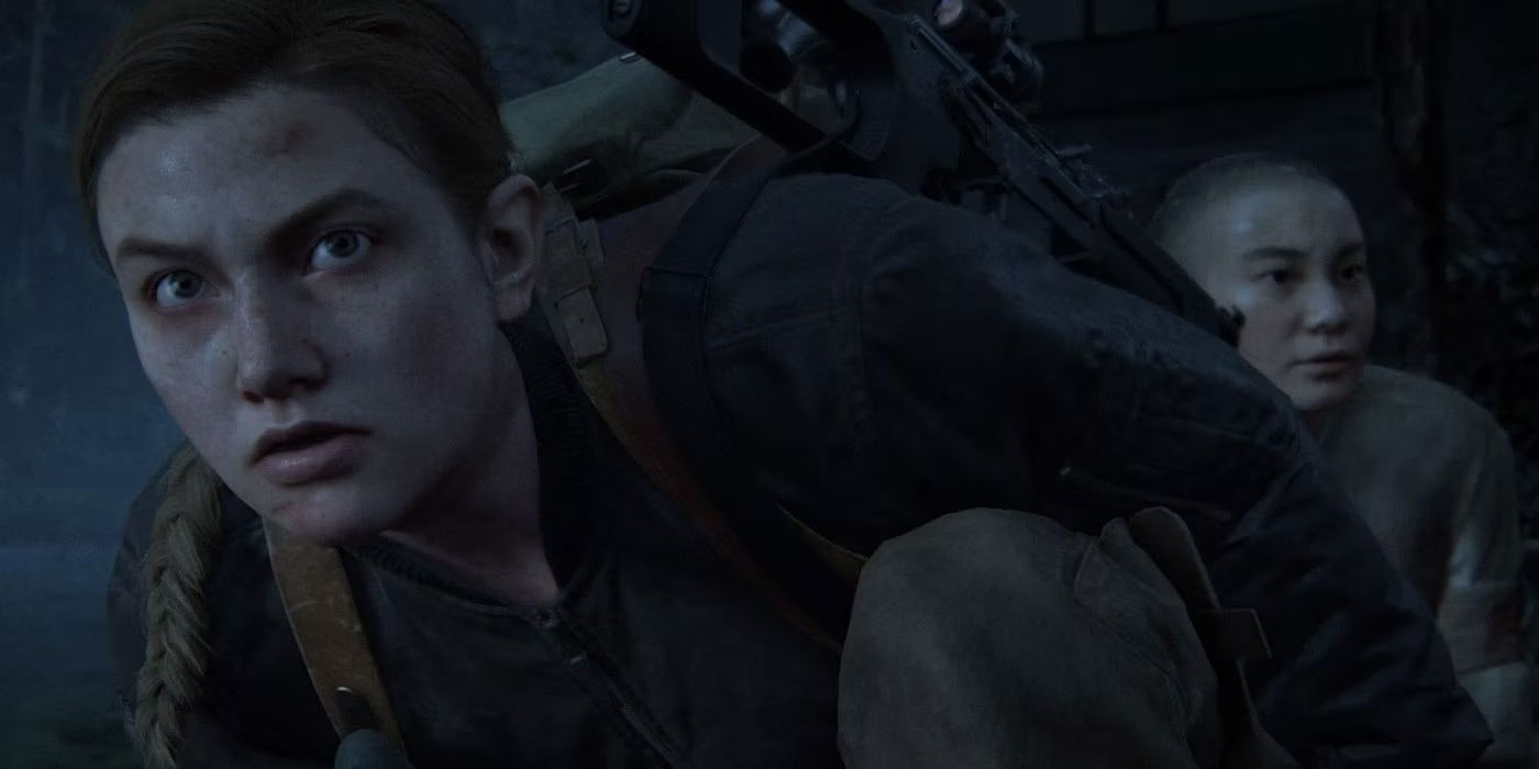 Abby protecting Lev in The Last of Us Part II