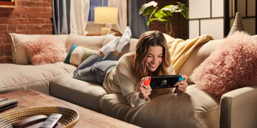 Annie Murphy playing Switch on her couch