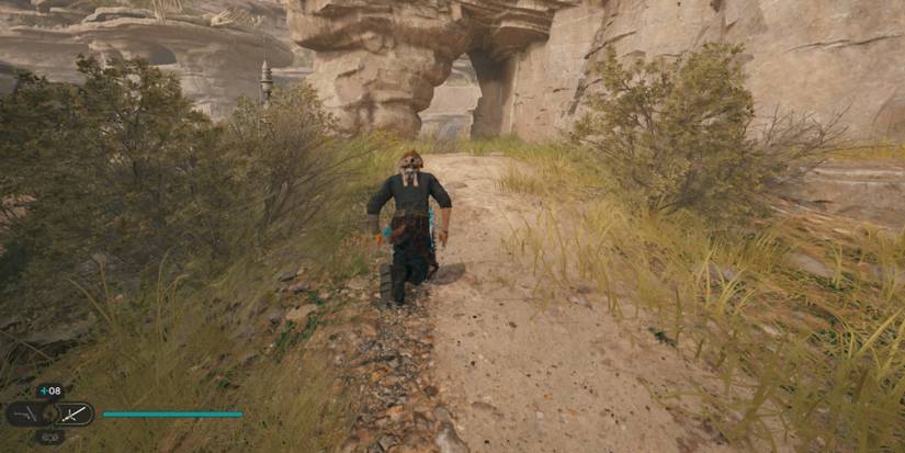 Cal approaches a stone archway in Star Wars Jedi: Survivor