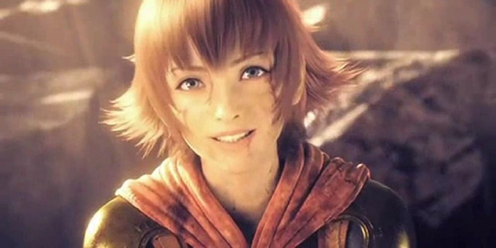 A battle weary Cater smiling at the end of Final Fantasy Type-0