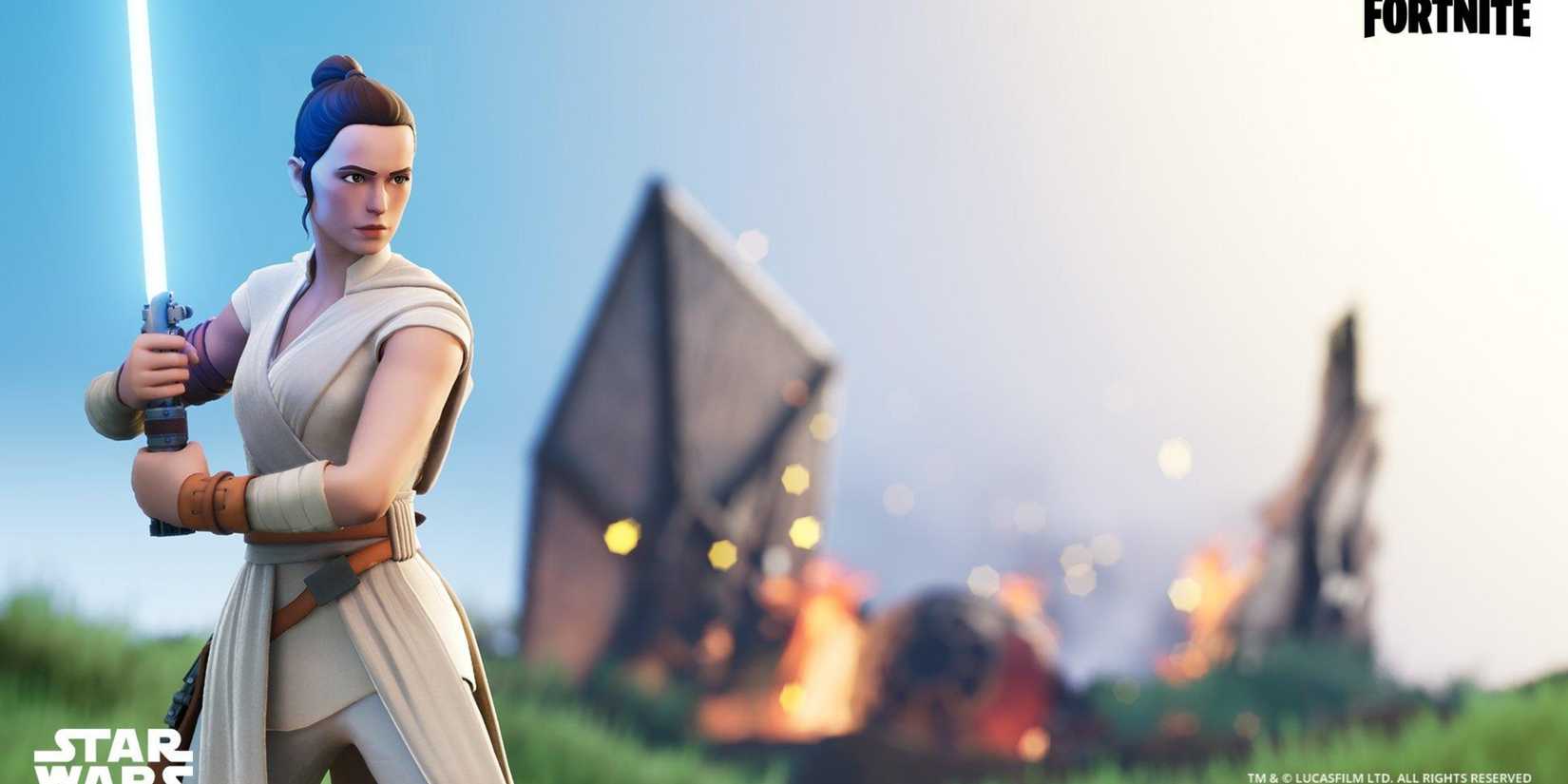 rey with the skywalker lightsaber