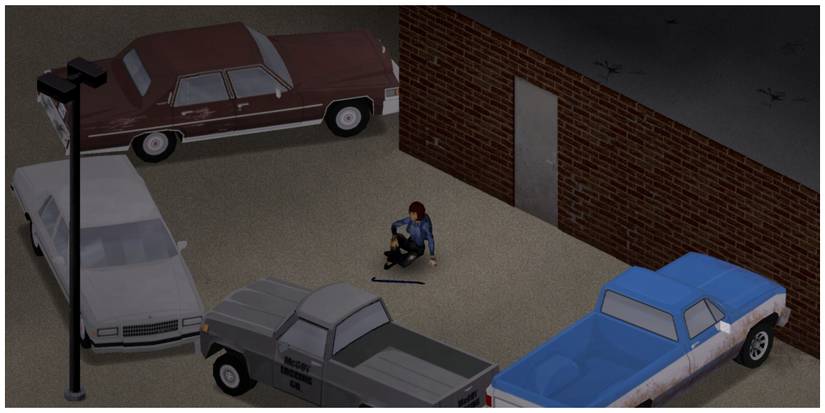 Survivor resting between cars