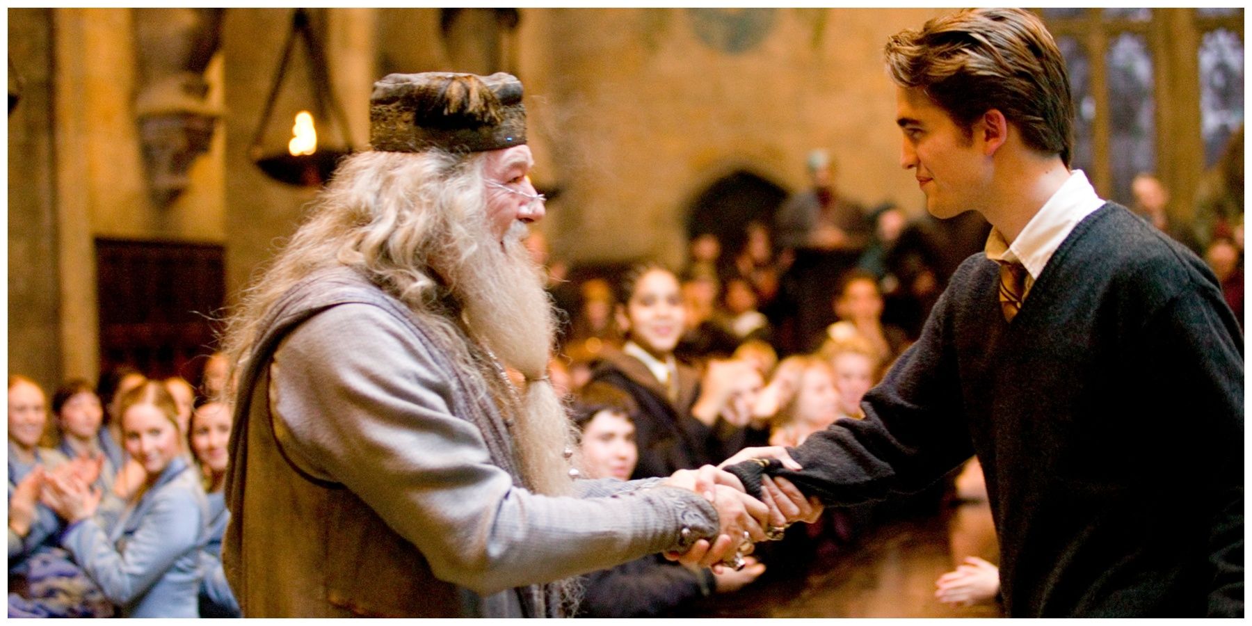 Michael Gambon as Albus Dumbledore. Robert Pattinson as Cedric Diggory.
