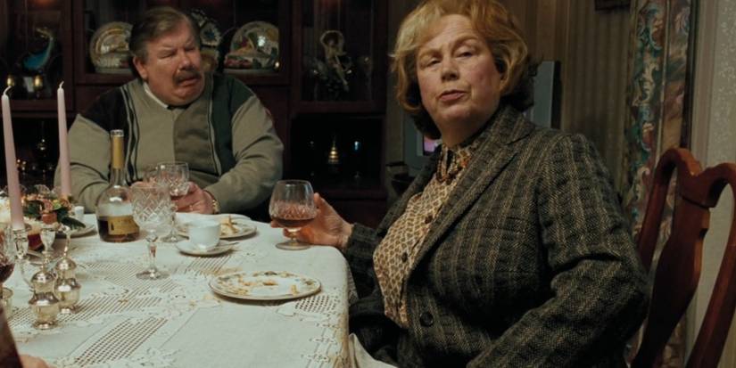 Vernon And Marge Dursley at the dining table in Harry Potter and the Prisoner of Azkaban.
