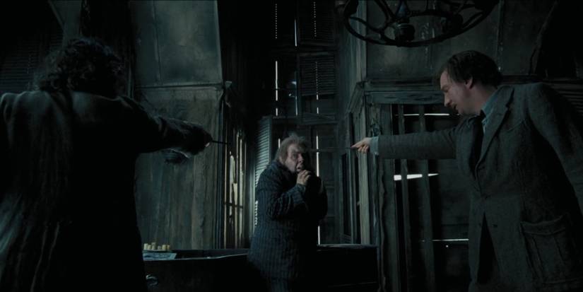 Sirius Black and Remus Lupin point wands at Peter Pettigrew in Harry Potter and the Prisoner of Azkaban.