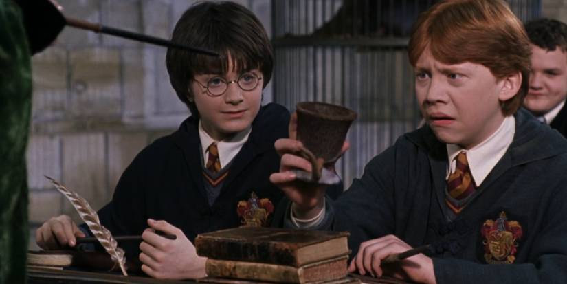 Harry watches Ron turn Scabbers into a cup with a rat tail in Harry Potter and the Chamber of Secrets.