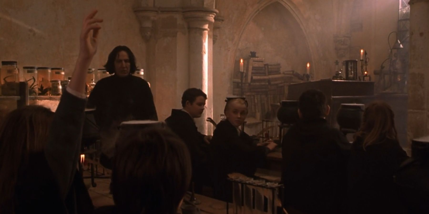 Hermione Granger raises her hand in Snape's class in Harry Potter and the Sorcerer's Stone.