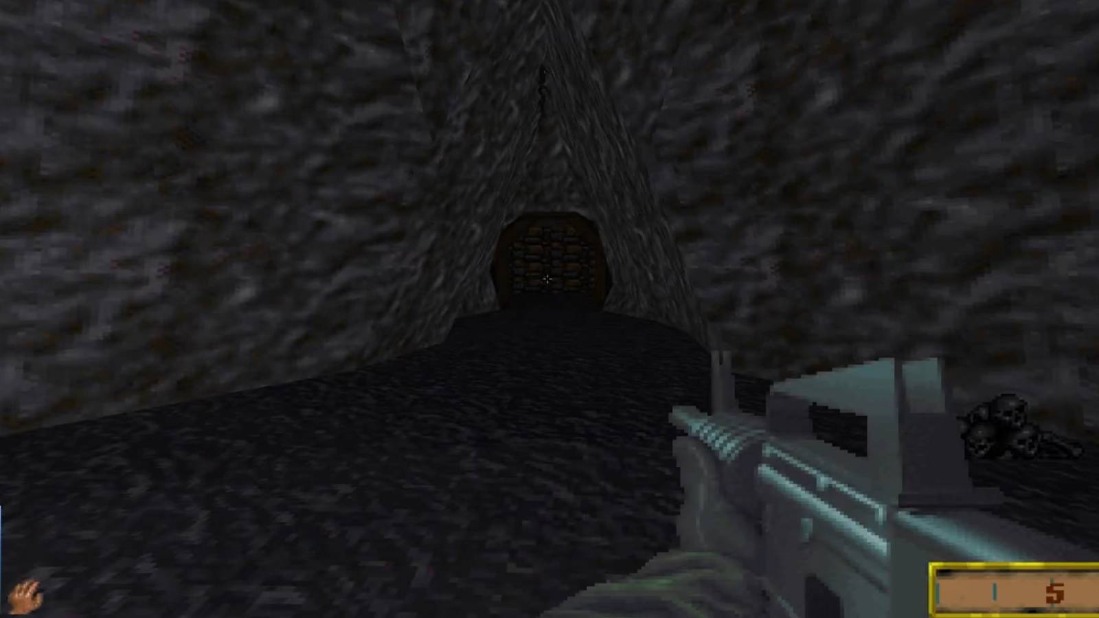 Screenshot from The Elder Scrolls 2: Daggerfall showing the player holding an assault rifle.
