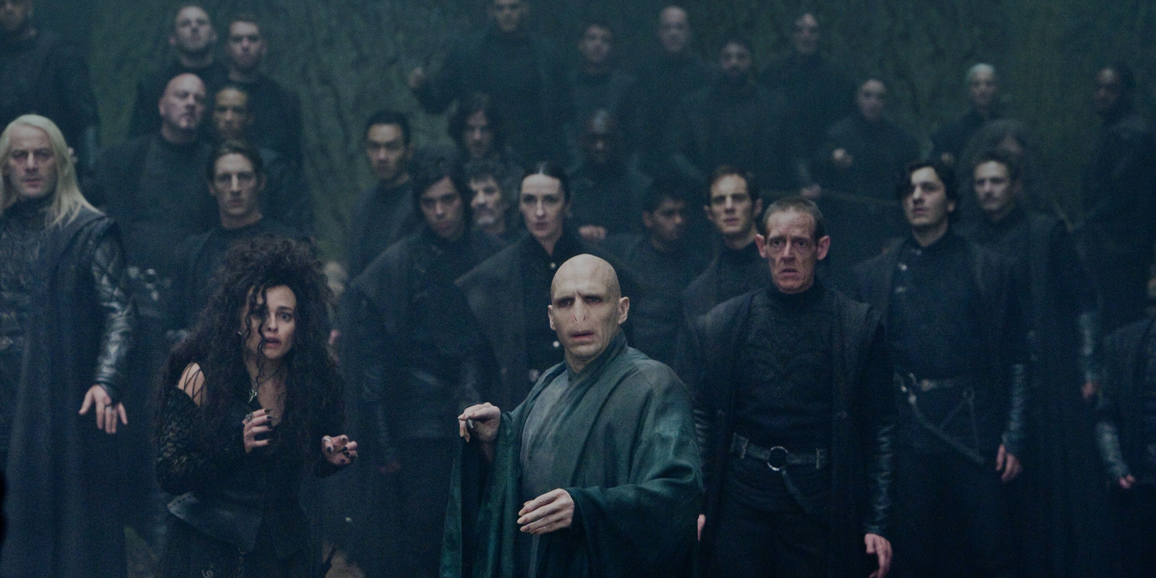 Death Eaters standing behind Voldemort in Harry Potter