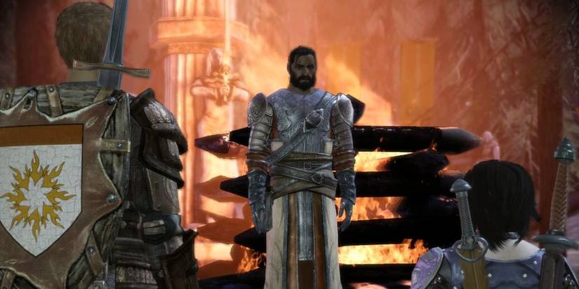 Duncan gives Alistair and the Warden instructions at the Grey Warden camp in Dragon Age: Origins