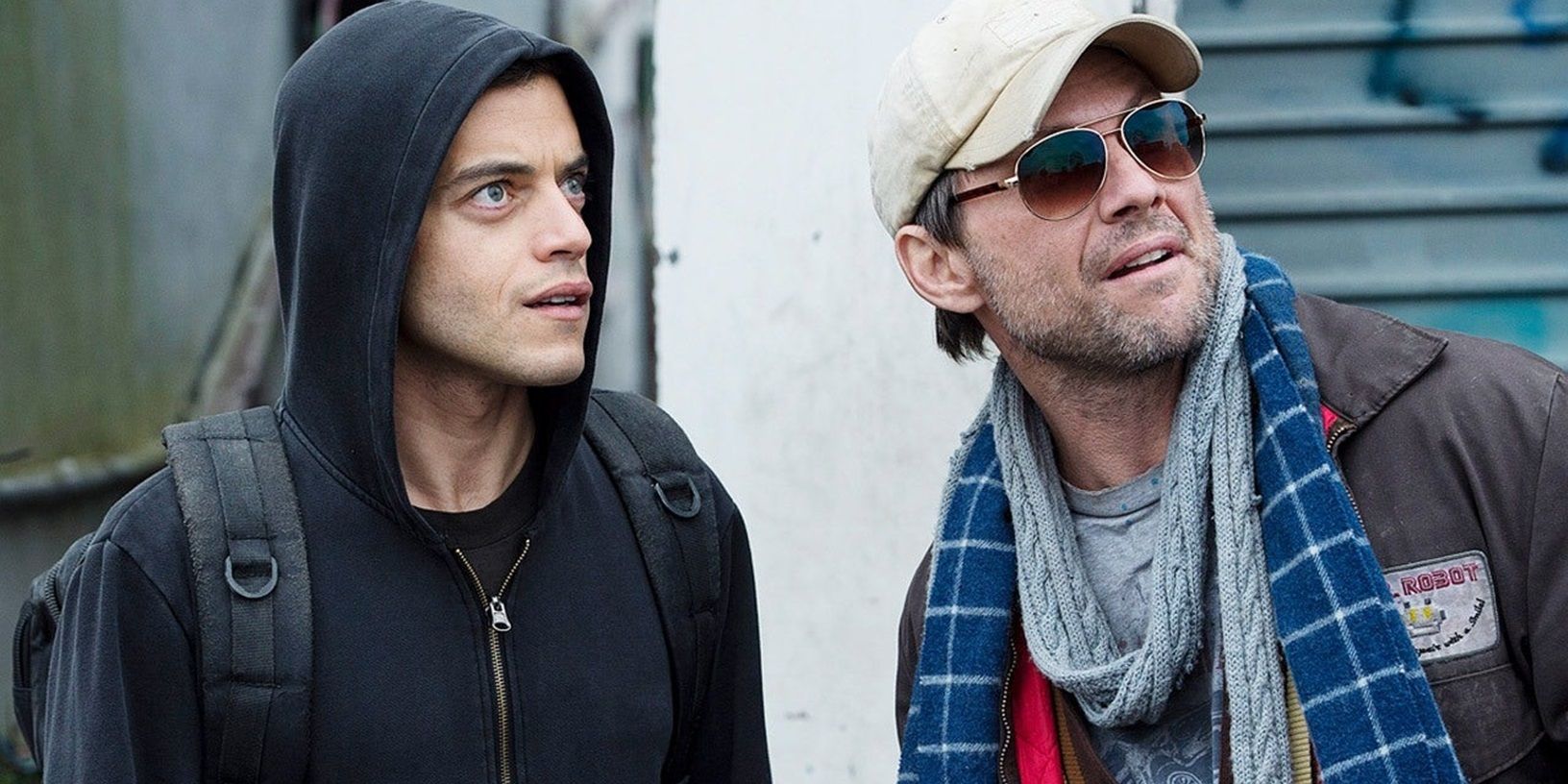 Elliot and Mr Robot looking off-screen in Mr Robot