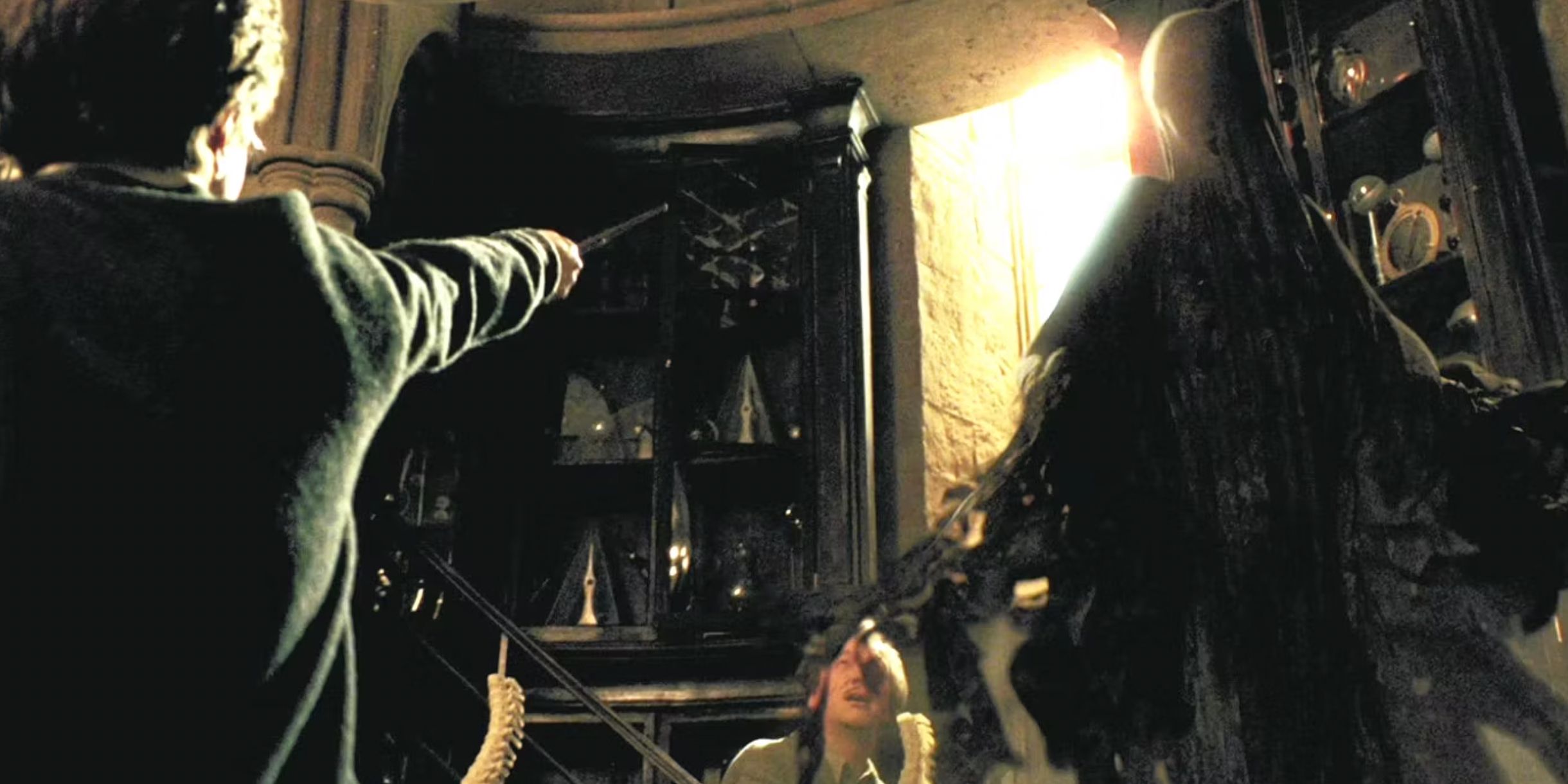 Harry aims his wand at a boggwart in the shape of dementor in Harry Potter and the Prisoner of Azkaban
