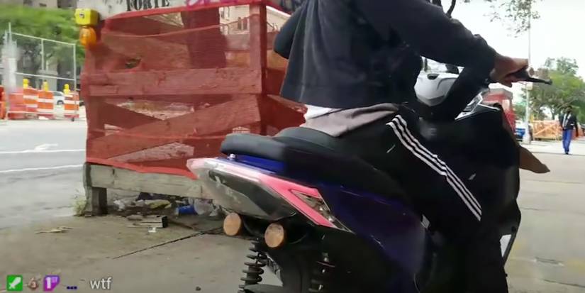 guy on moped mugging hoshi