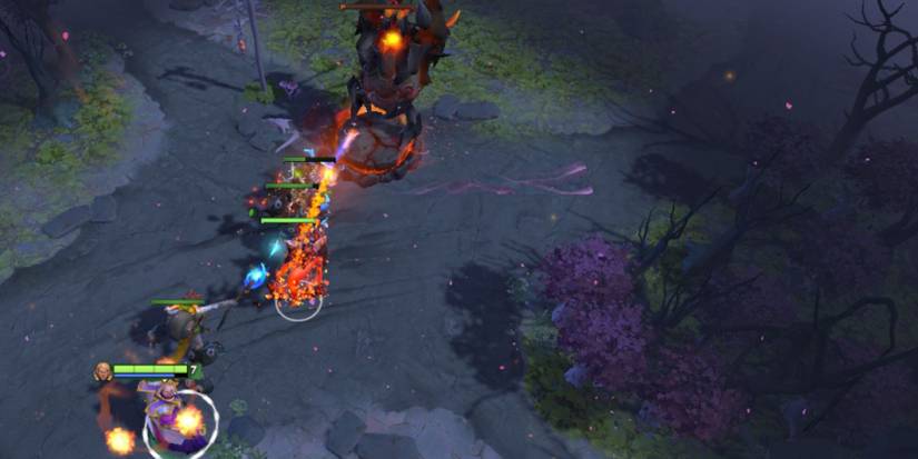 Invoker summons Forge Spirits to attack an enemy tower