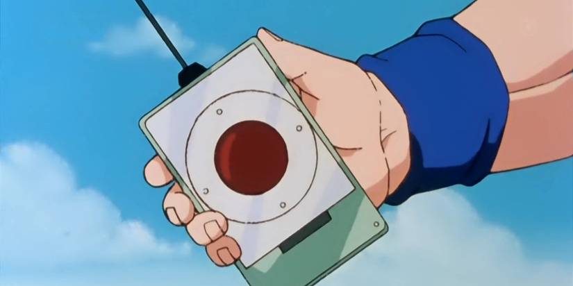 Krillin holding the detonator to shut down Android 18 in Dragon Ball Z