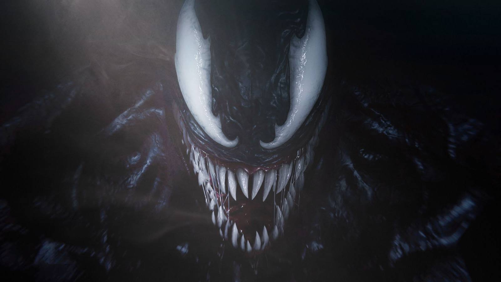 A close-up screenshot of Venom emerging from the shadows in Marvel's Spider-Man 2.