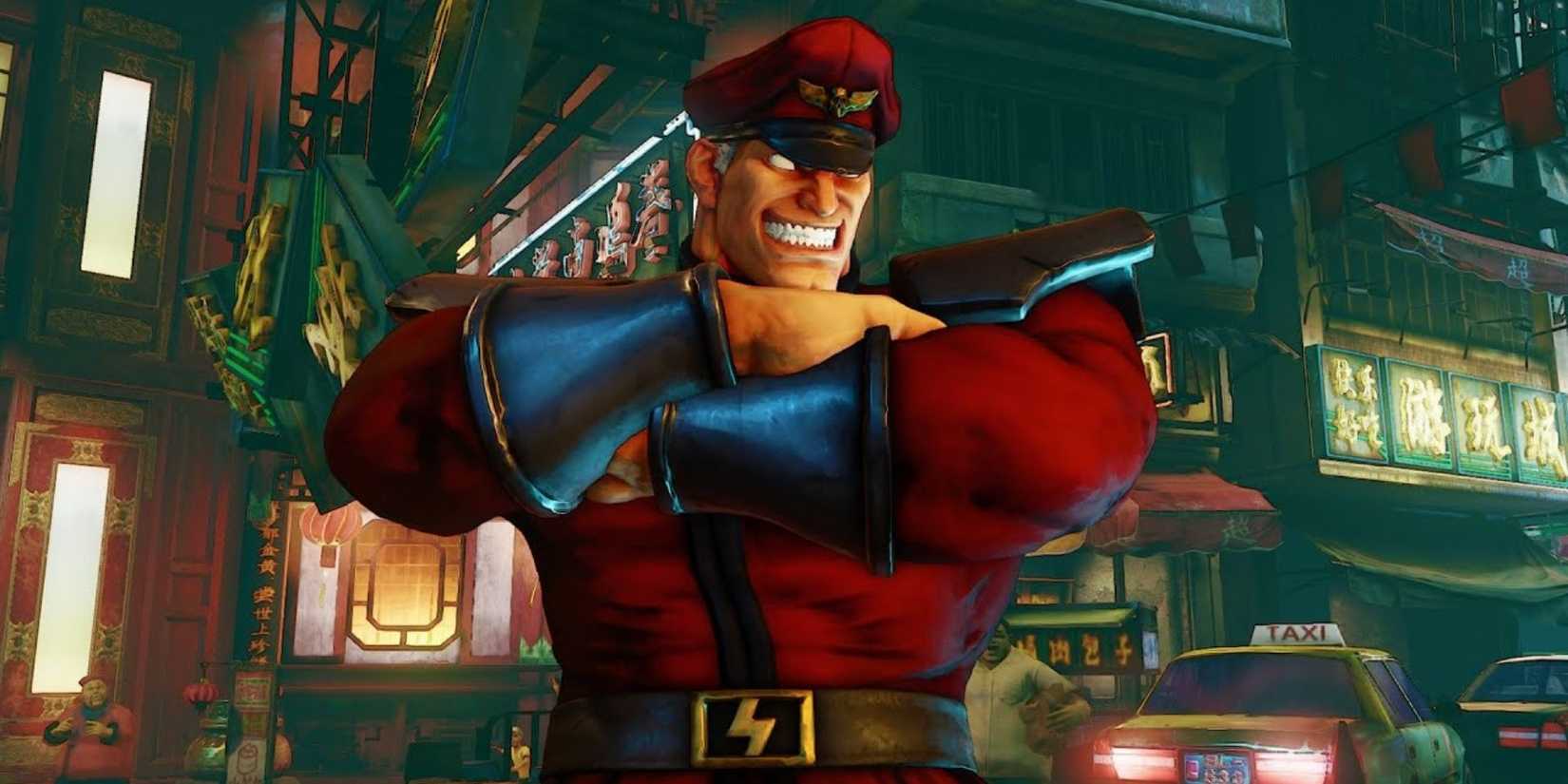 M.Bison grinning at his enemy