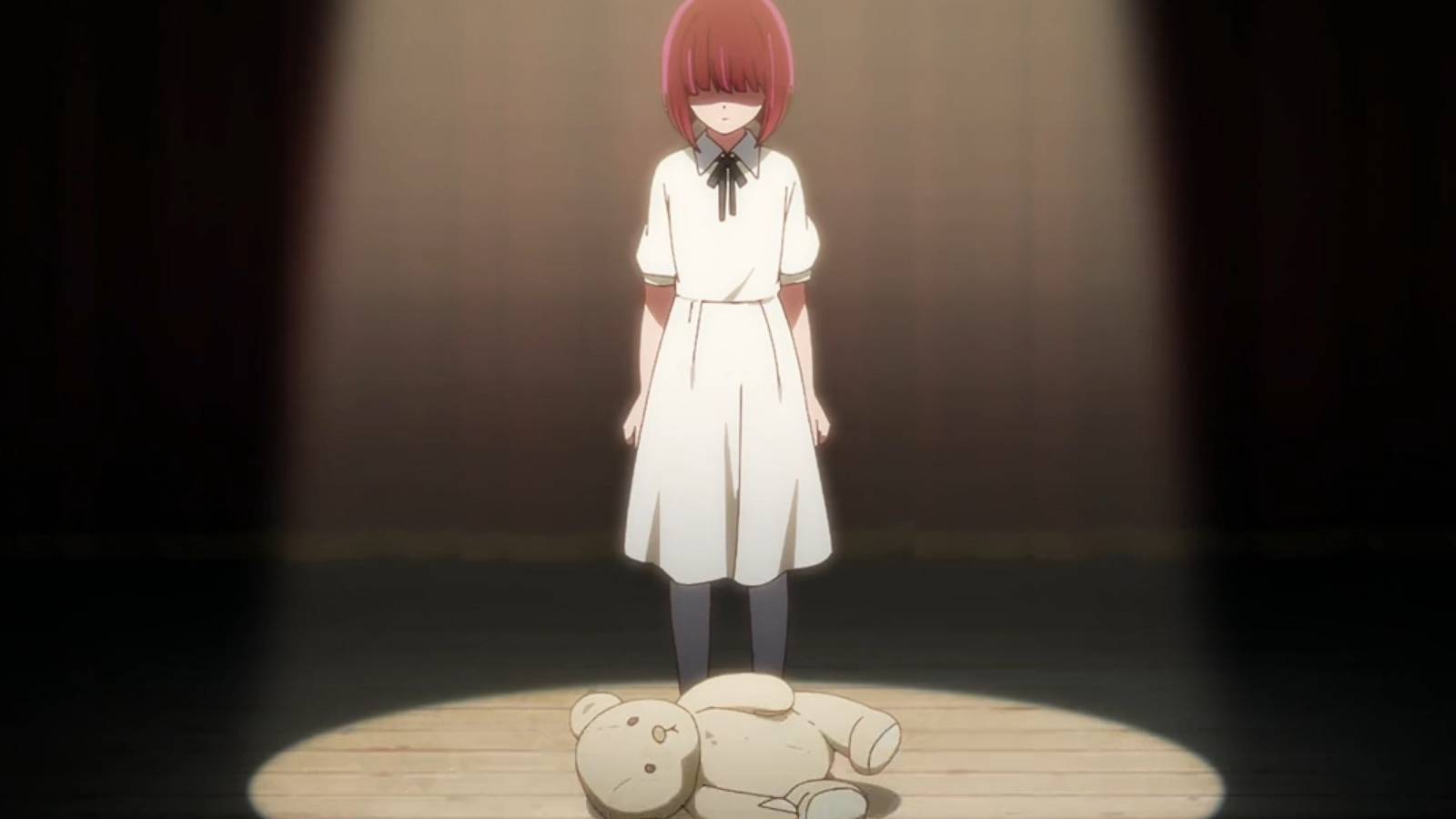 Oshi no Ko E4 young Kana standing in front of a teddy bear