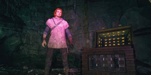 cal kestis wearing the poncho next to a chest