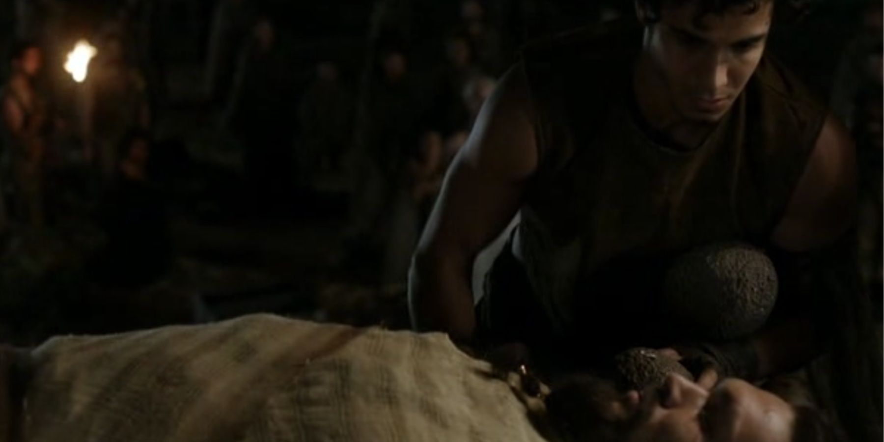 Rakharo places dragon eggs with Drogo in Game of Thrones.