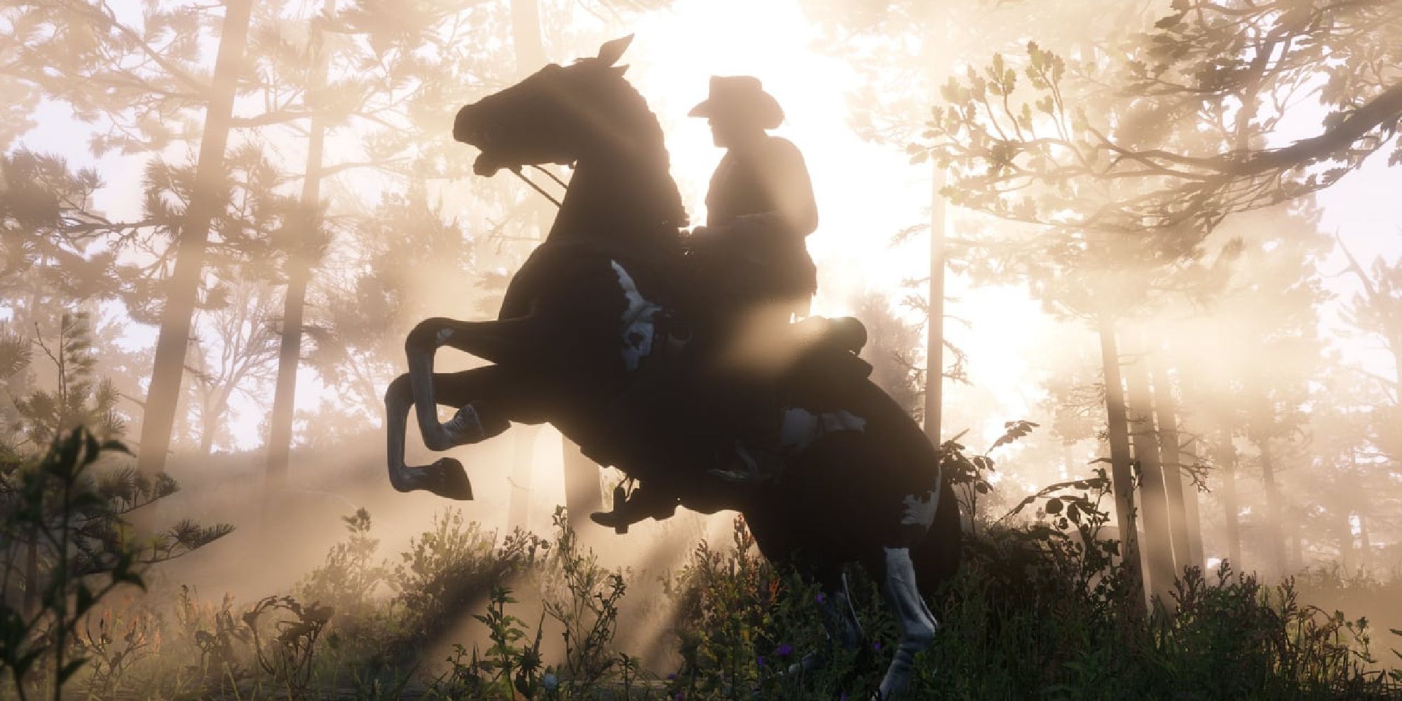 Arthur Morgan rears up on his horse, the sun silhouetted behind him. 