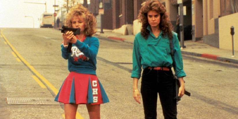 Reggie_and_Sam_with_a_gun_in_Night_of_the_Comet