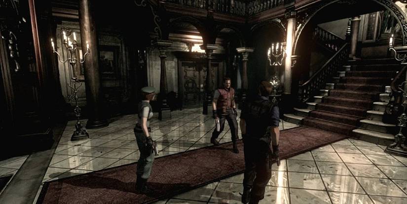 Jill, Wesker and Barry standing in the main foyer of the Spencer Mansion in the remake of Resident Evil 