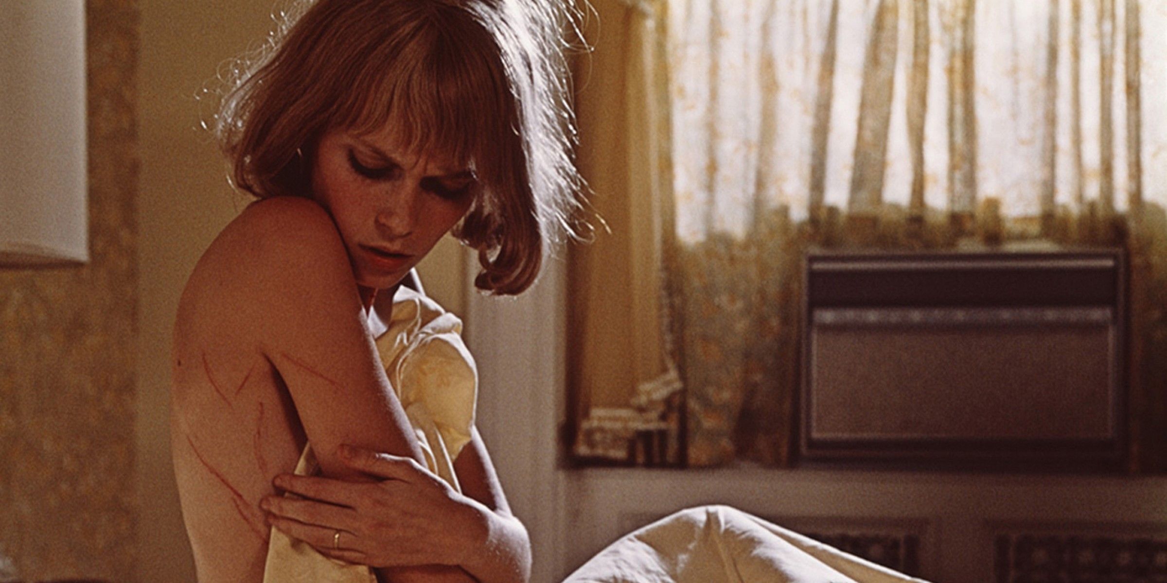 Rosemary looking at her scars in Rosemary's Baby (1968)