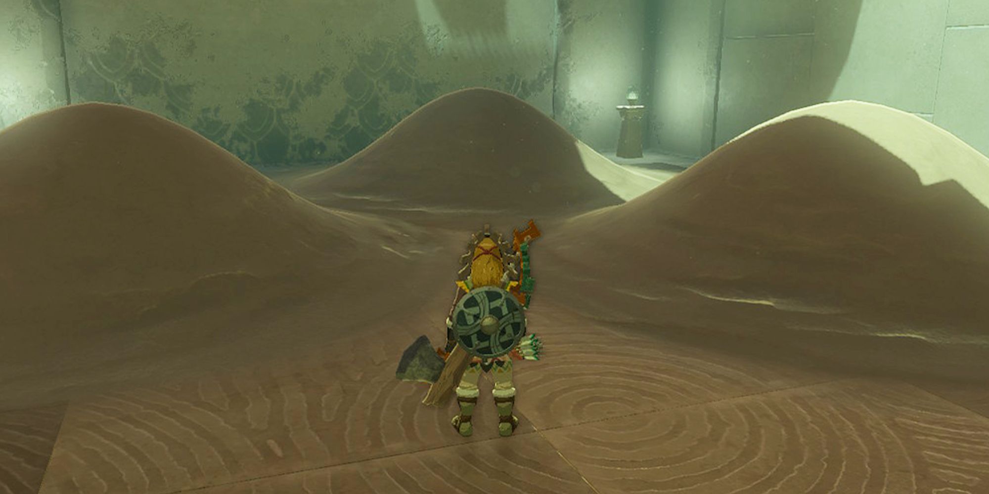 Link looking at piles of sand in Shrine