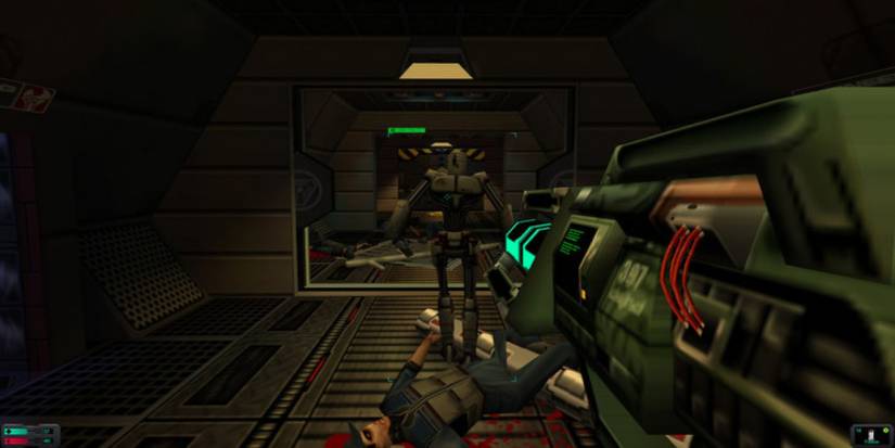 A player aiming at an enemy in front of them in System Shock 2