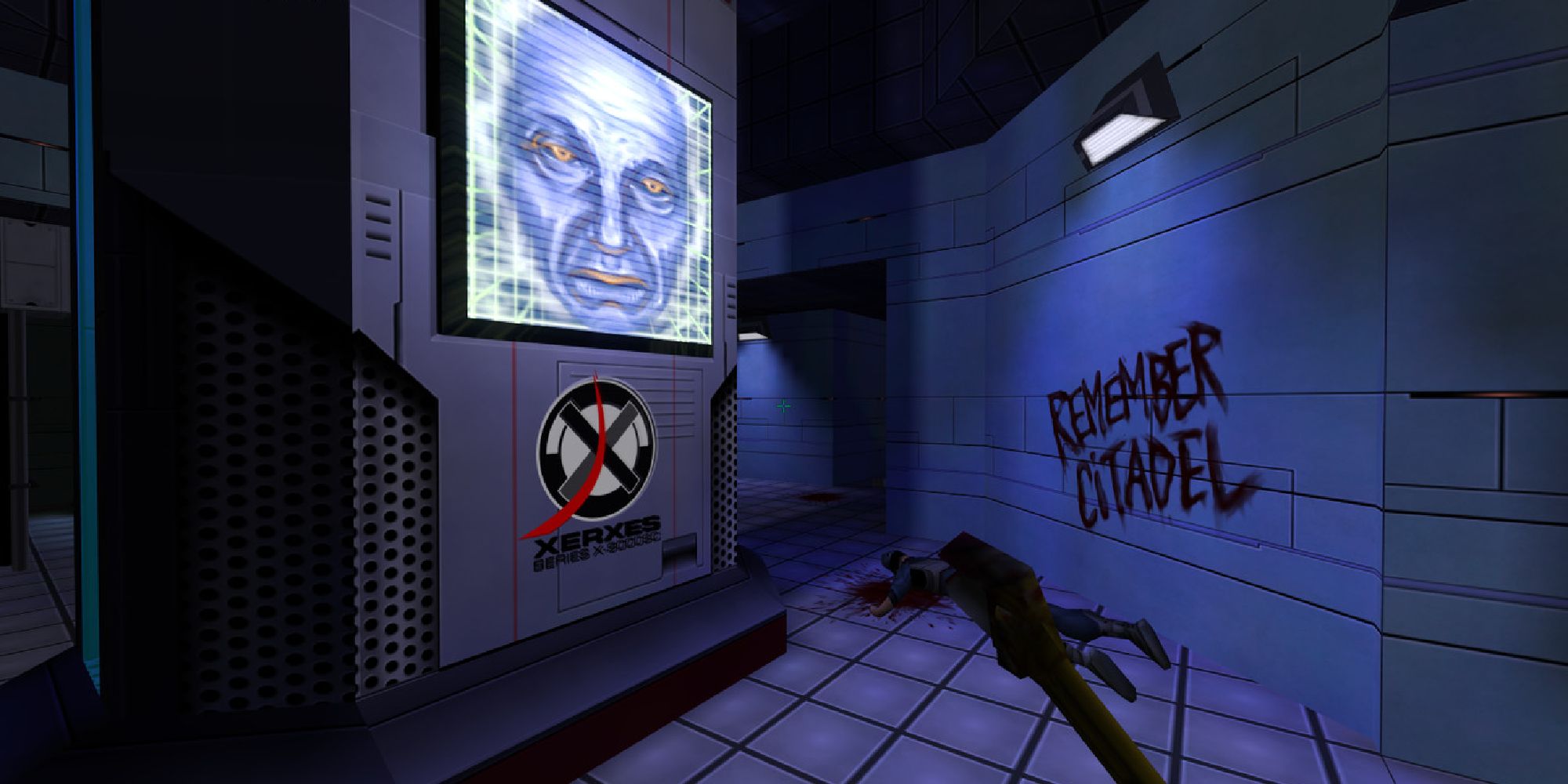 A screenshot showing the desolate hallways of System Shock 2, a screen showing an AI face on one wall, graffiti on the other and a dead body. 
