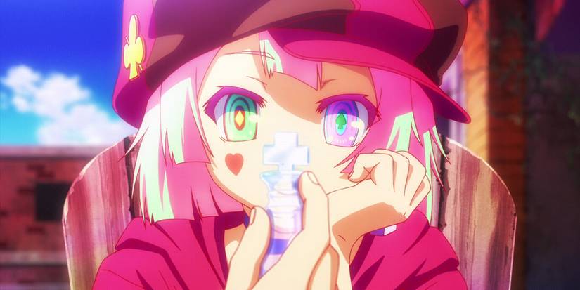 Tet holding a chess piece