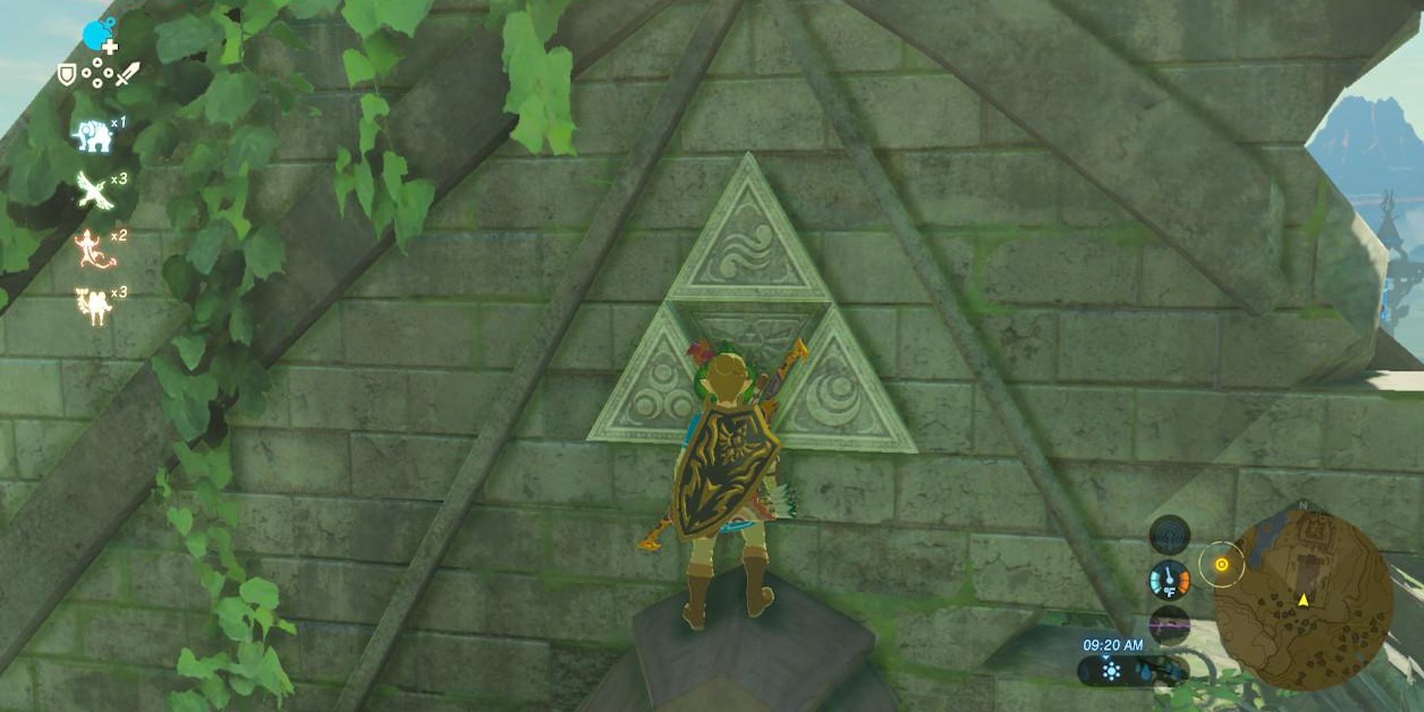 Link looks at Triforce