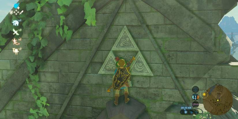 Link looking at Triforce