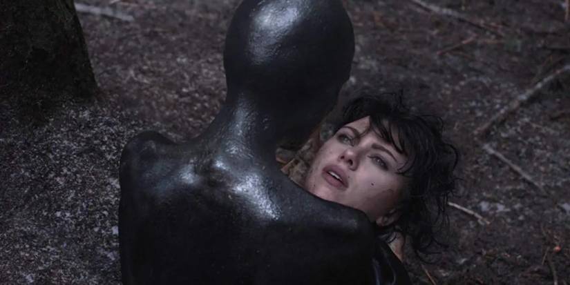A black entity with Scarlett Johansson's alien in Under The Skin