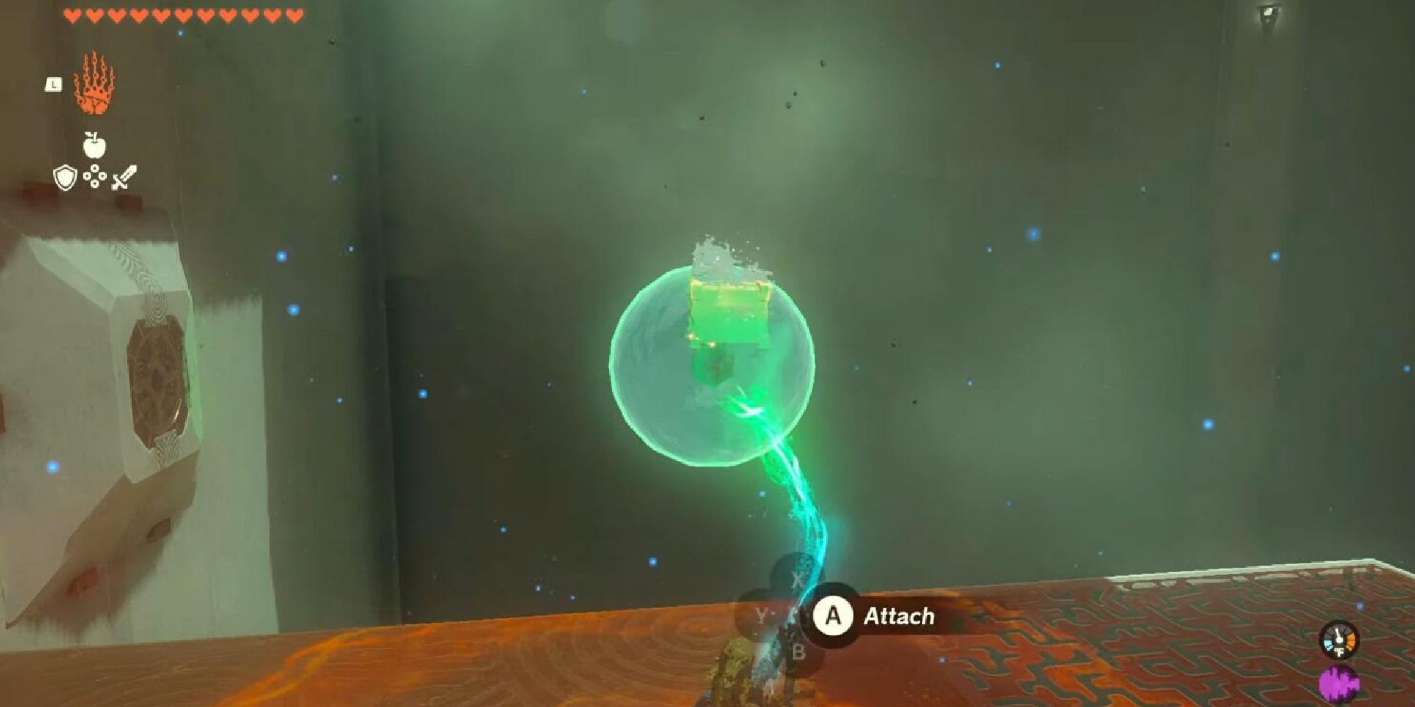 Link using Ultrahand to move about an orb of water. 