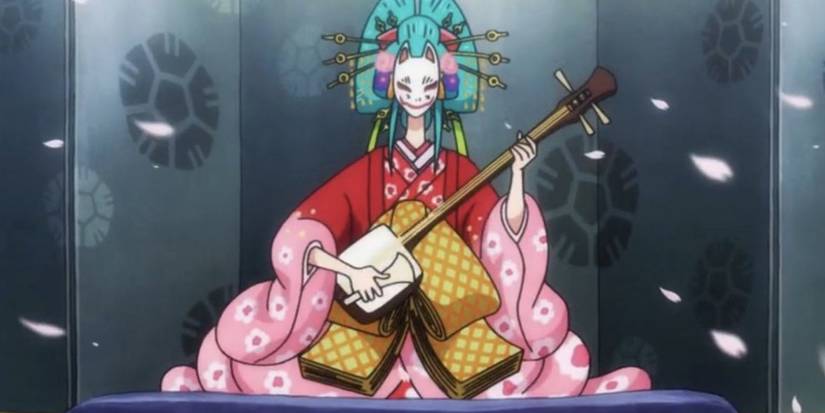 Komurasaki playing the shamisen