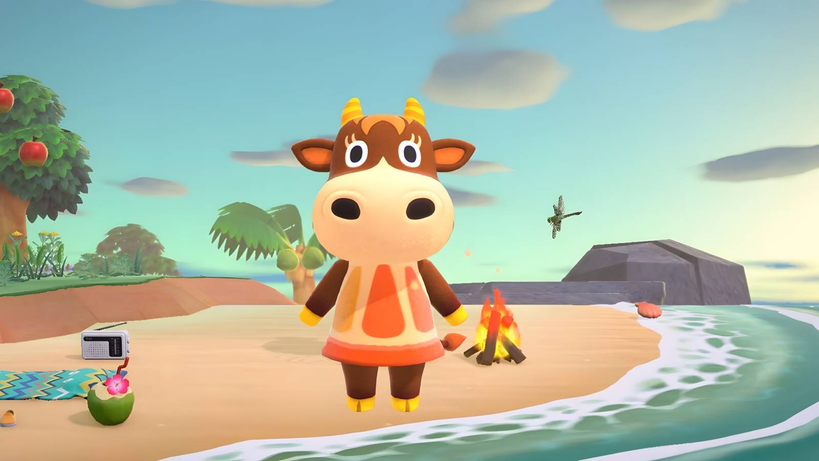 Animal Crossing New Horizons cow villager standing on a beach