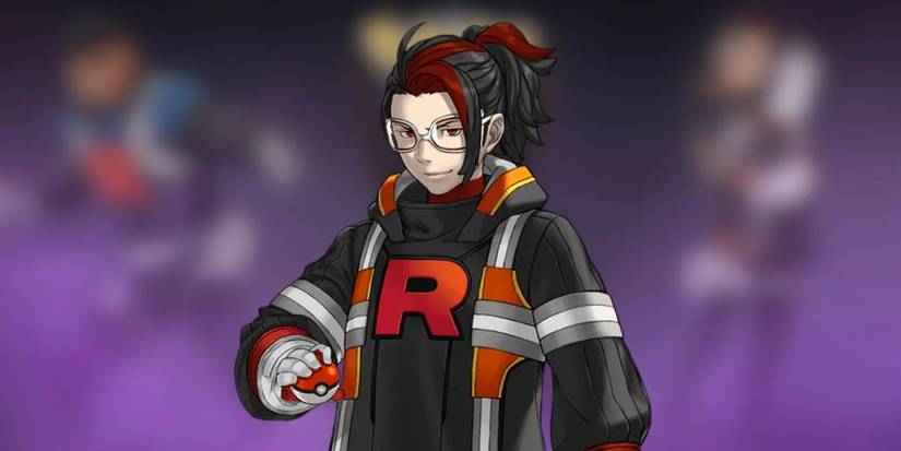Team Rocket leader Arlo stands with a Pokeball in his hand, smiling self-assuredly