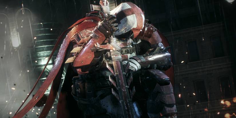 Azrael knelt down leaning on his sword 