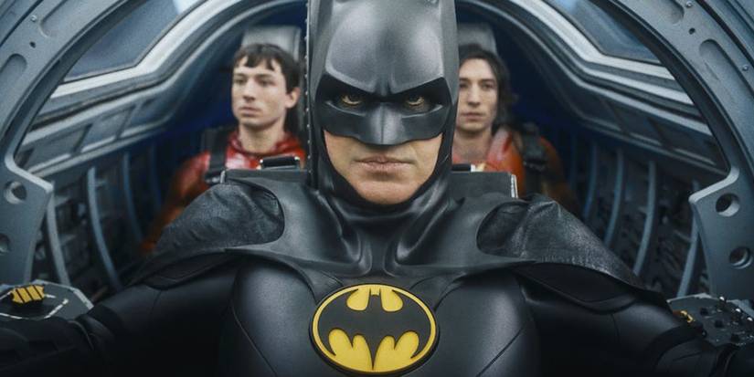 batman flying the batwing with two barry allens behind him