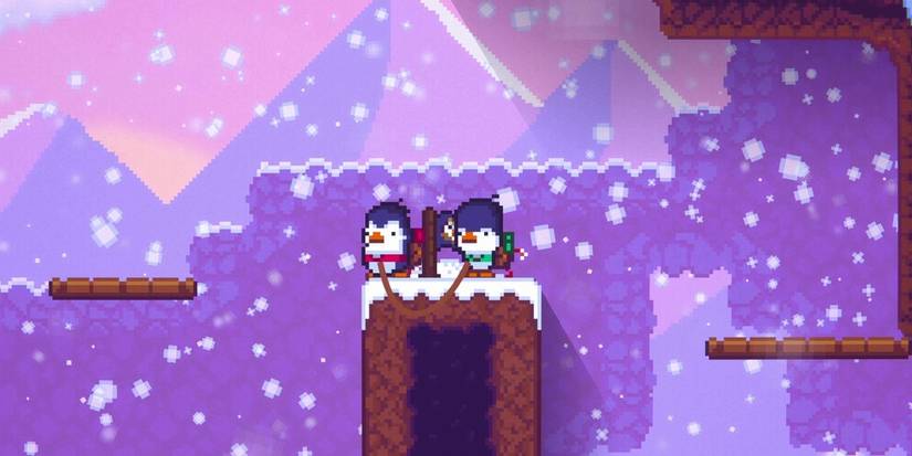 A screenshot featuring two penguins on a pixel mountain from Bread & Fred.